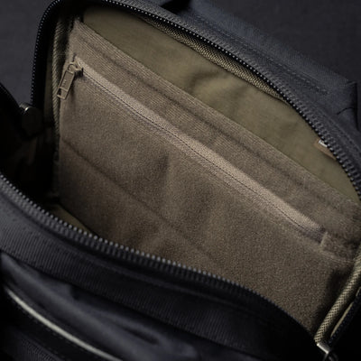 Wotancraft Mini Rider v2 inner zip pocket and olive lining close-up