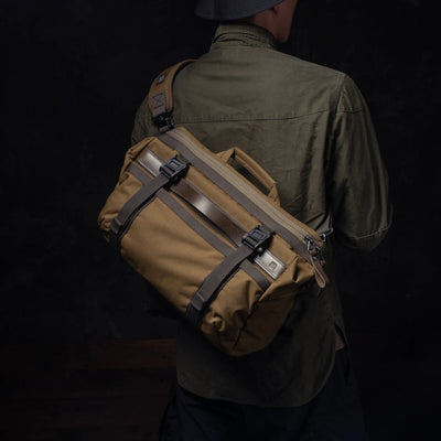 Man wearing the Wotancraft Lightning Rider v2 khaki sling bag on his back
