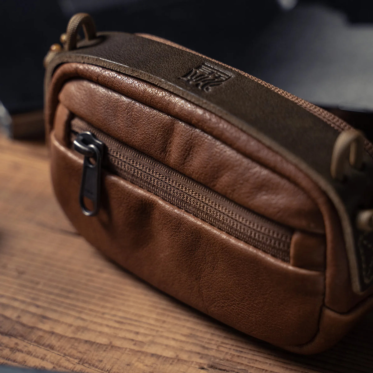 Wotancraft leather camera pouch front zip pocket close-up