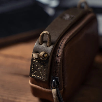 Wotancraft pouch paracord loop and stitched leather tab close-up