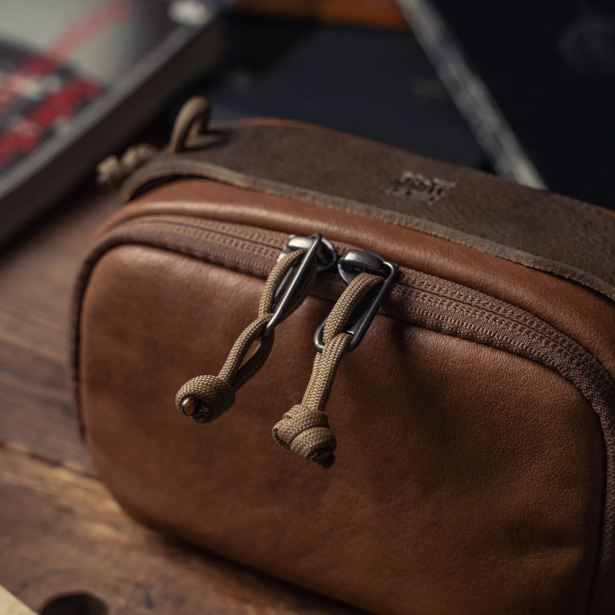 Wotancraft brown leather camera pouch double zip pulls with paracord