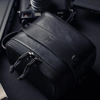 Wotancraft black leather pouch embossed logo and paracord zip pulls