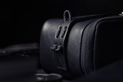 Wotancraft black leather pouch paracord loop detail, side view