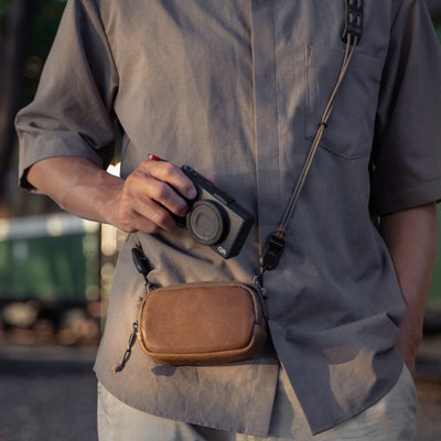 Man with a Ricoh GR and the Wotancraft brown leather small pouch on a strap