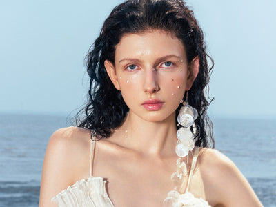 Portrait of a woman by the sea, sample photo from the Viltrox AF 85mm f/1.4 Pro