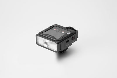 Viltrox Spark Z3 TTL flash, angled front view on grey