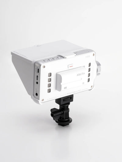 Viltrox DC-V1 white with sunhood, battery and shoe mount, back view