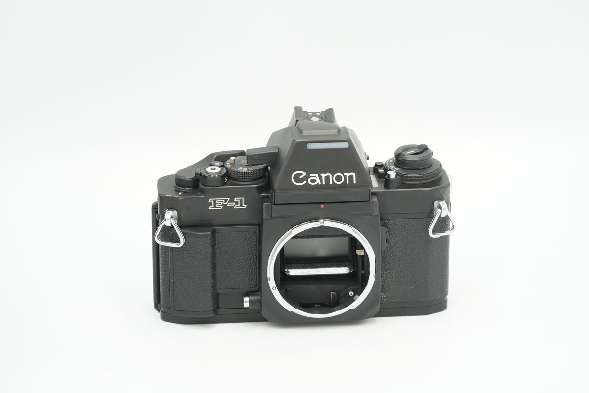 Canon New F-1 black SLR body, straight-on front view