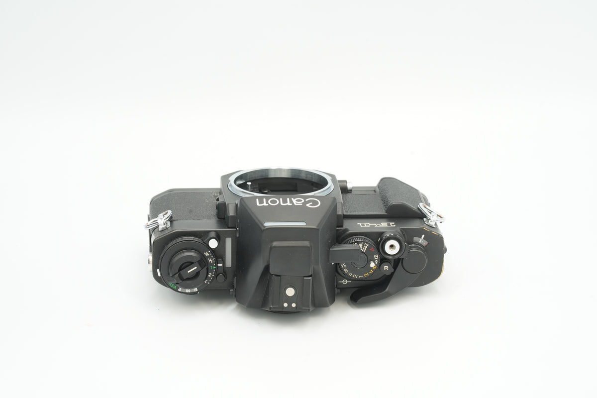 Canon New F-1 black, top view with shutter speed dial