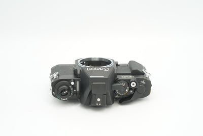 Canon New F-1 black, top view with shutter speed dial