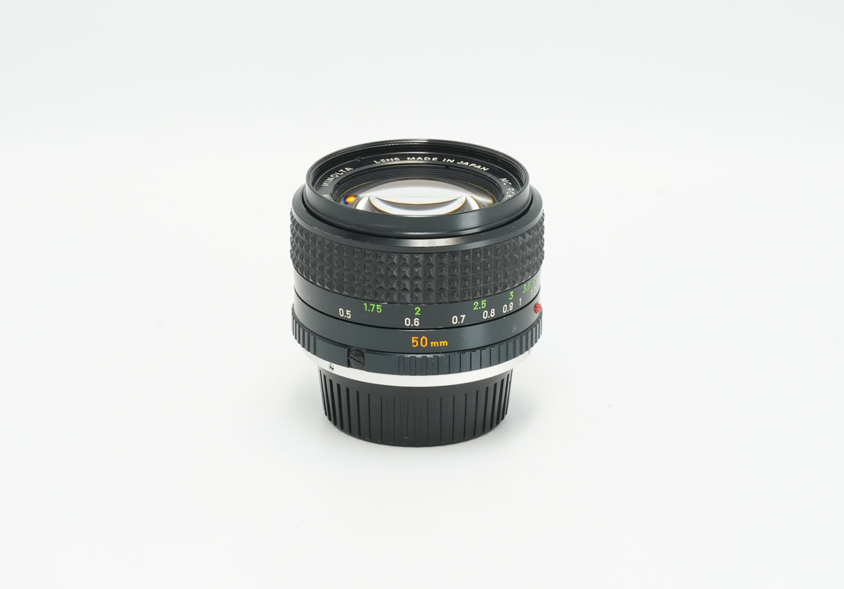 Minolta MC Rokkor-PG 50mm f/1.4, side view with focus scale