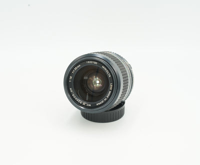 Minolta MC W.Rokkor-HH 35mm f/1.8 wide-angle lens, angled view