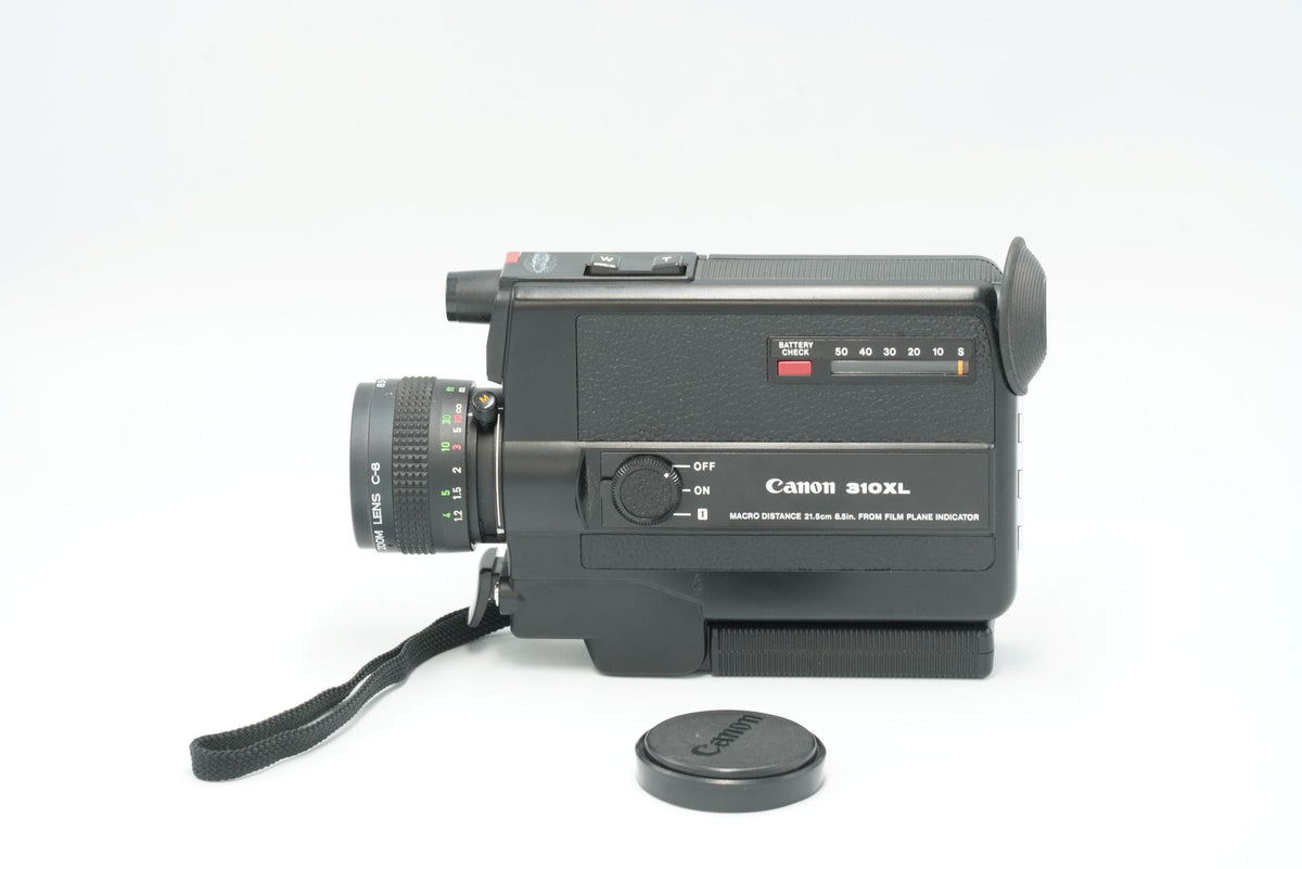 Canon 310XL Super 8 camera side view showing the film counter and power switch