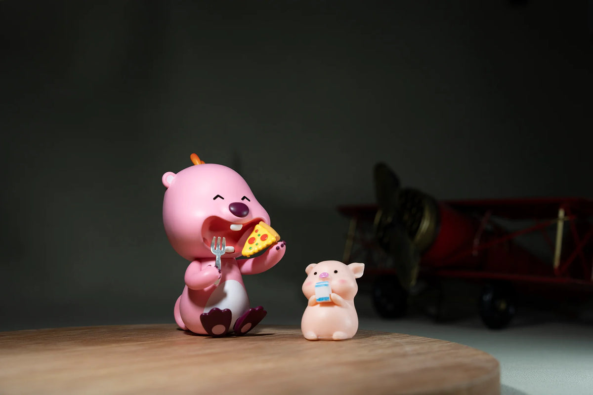 Toy figures lit by the TTArtisan mini LED light, cool light sample