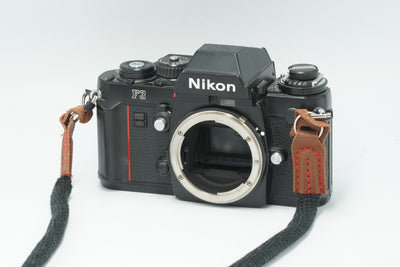 Nikon F3 black film camera body, front view without lens