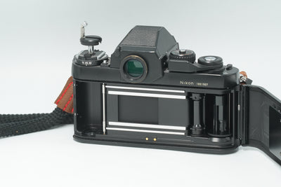 Nikon F3 film camera with the back open, showing the film chamber