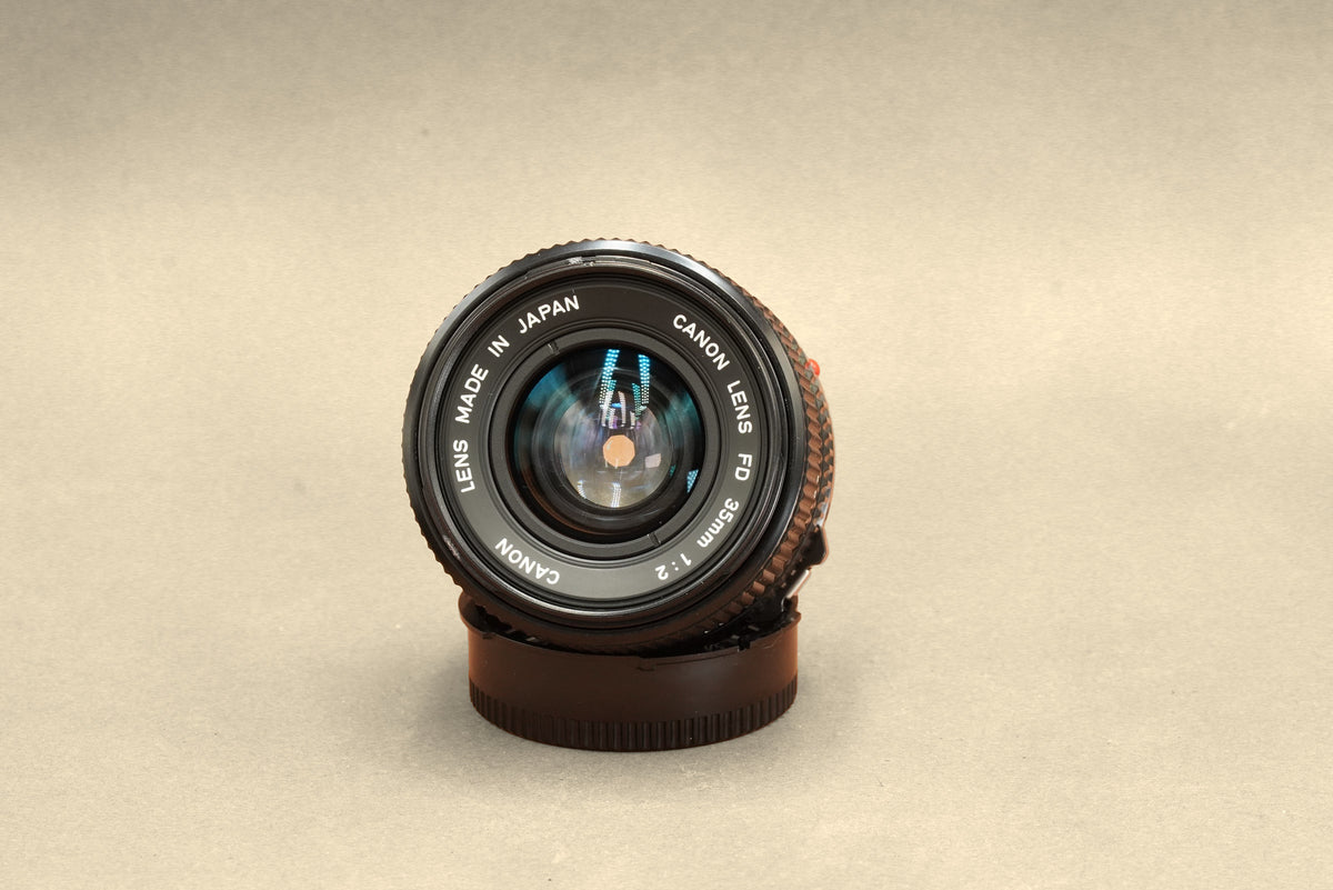 Canon nFD 35mm f/2, front element and lens name ring