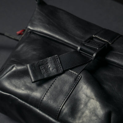 Wotancraft Pilot black leather Fidlock buckle and logo tab close-up