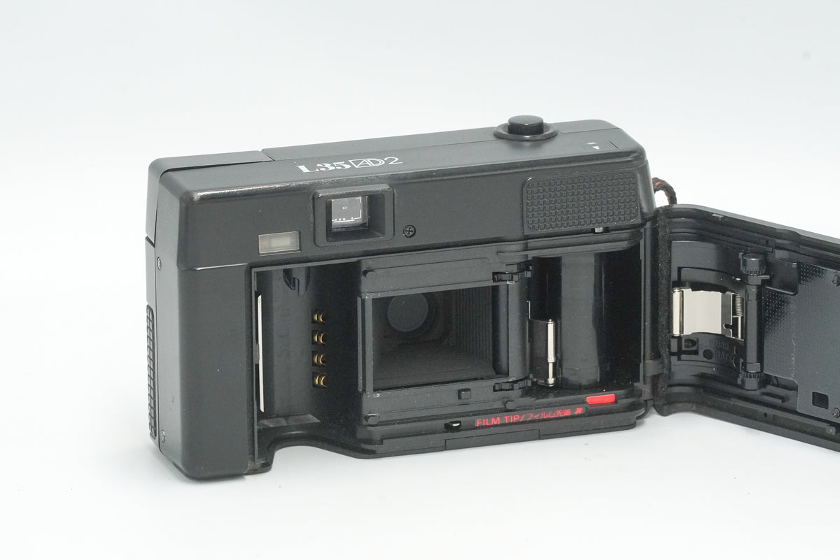 Nikon L35AD2 with the back open, showing the film chamber