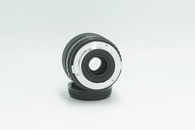 Olympus OM 35mm f/2.8, angled rear view with rear cap