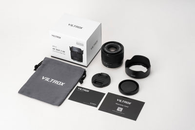 Viltrox Air AF f/1.7 XF box contents: lens, hood, pouch, caps and cards