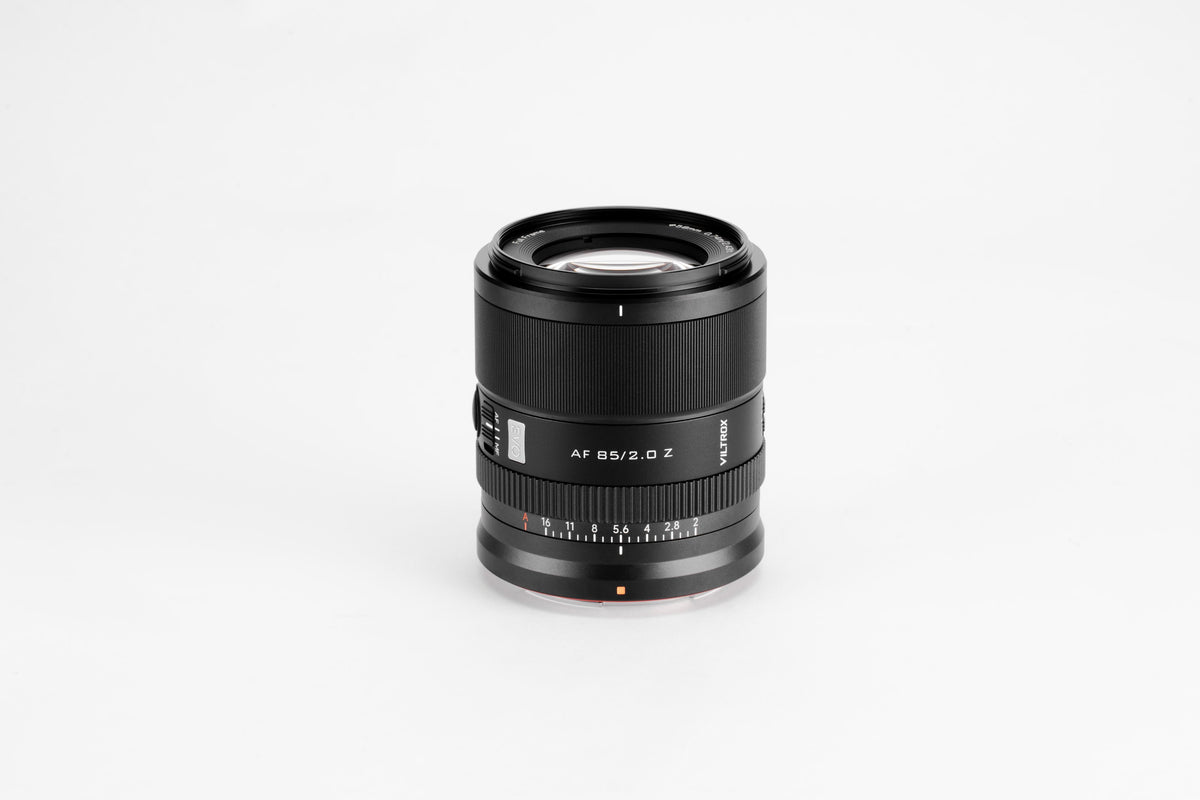 Viltrox AF 85mm f/2.0 Z lens on a grey background, front view