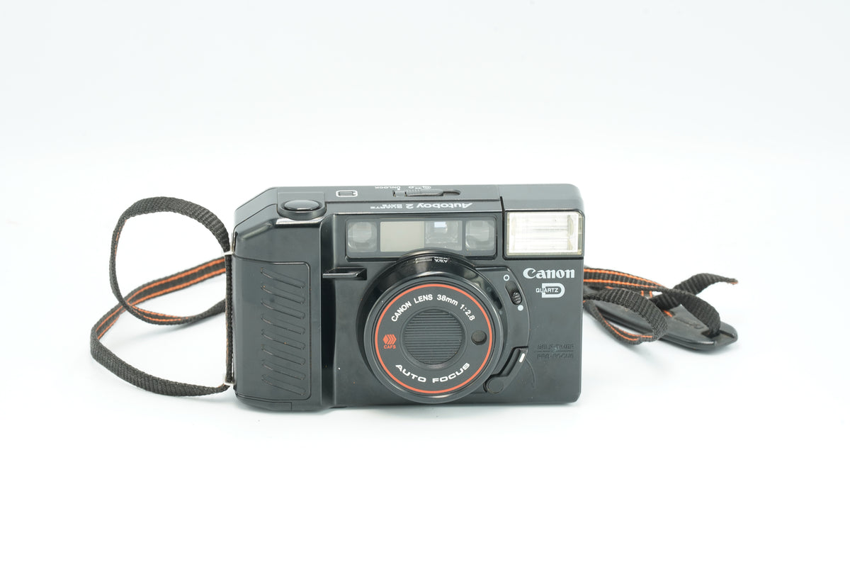 Canon Autoboy 2 Sure Shot point and shoot film camera with strap, front view