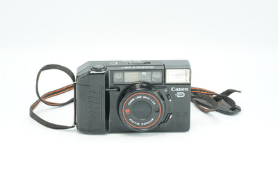 Canon Autoboy 2 Sure Shot point and shoot film camera with strap, front view