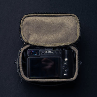 Wotancraft black canvas pouch open with a Leica Q inside, from above