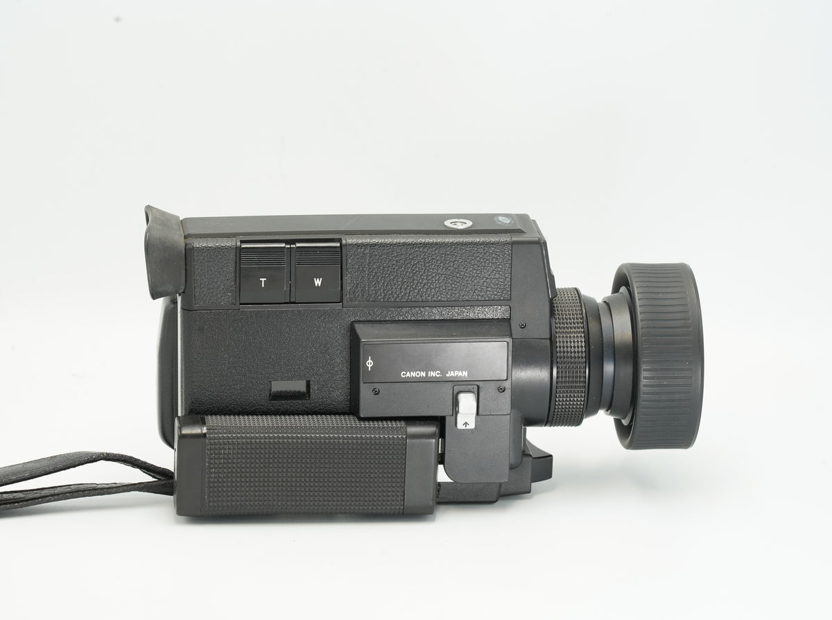 Canon Auto Zoom 512XL Super 8 camera, side view with zoom buttons and eyepiece
