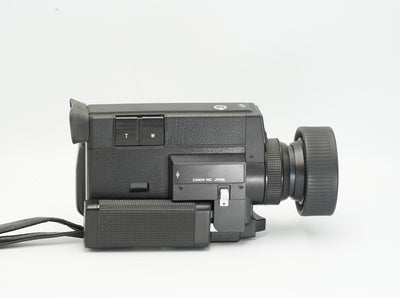 Canon Auto Zoom 512XL Super 8 camera, side view with zoom buttons and eyepiece