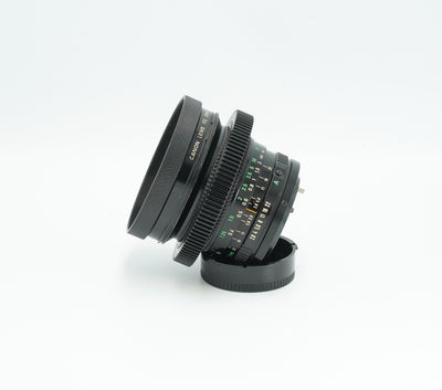 Canon nFD 20mm f/2.8 cine mod, side view with focus gear and FD scales