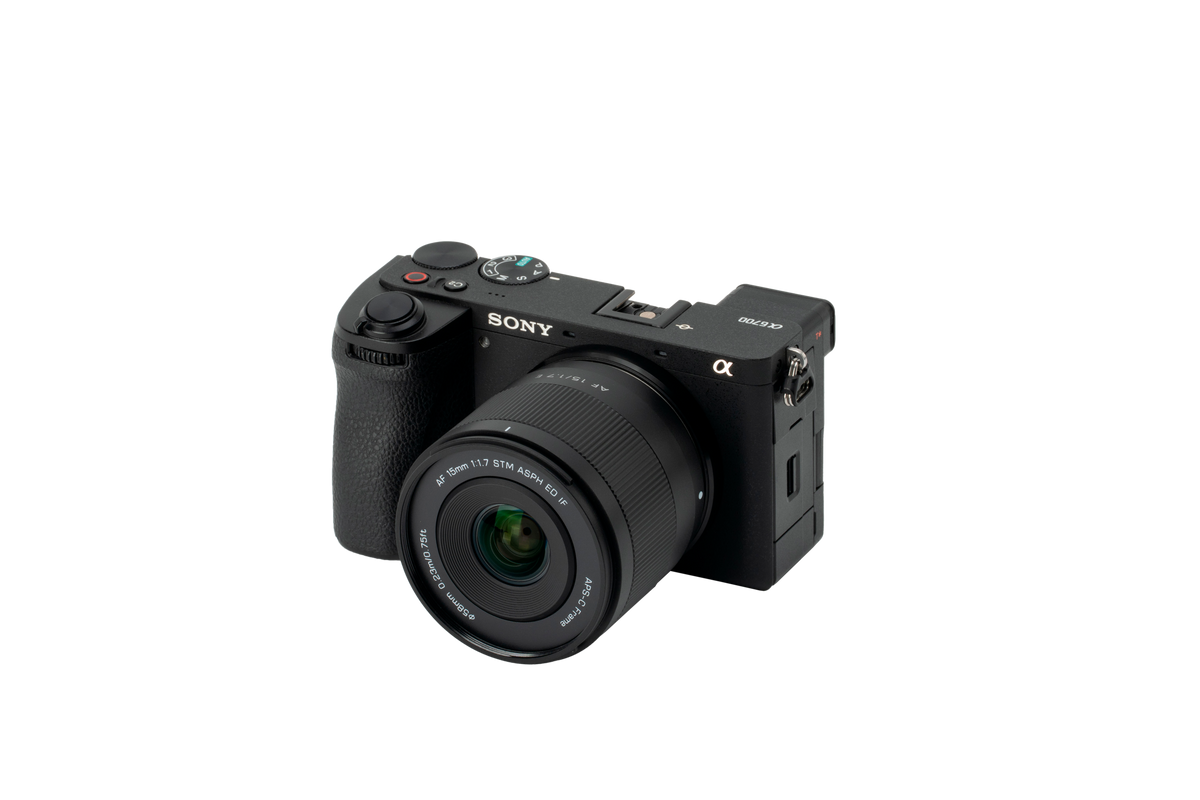 Viltrox Air AF 15mm f/1.7 on a Sony A6700 camera, front three-quarter view on white