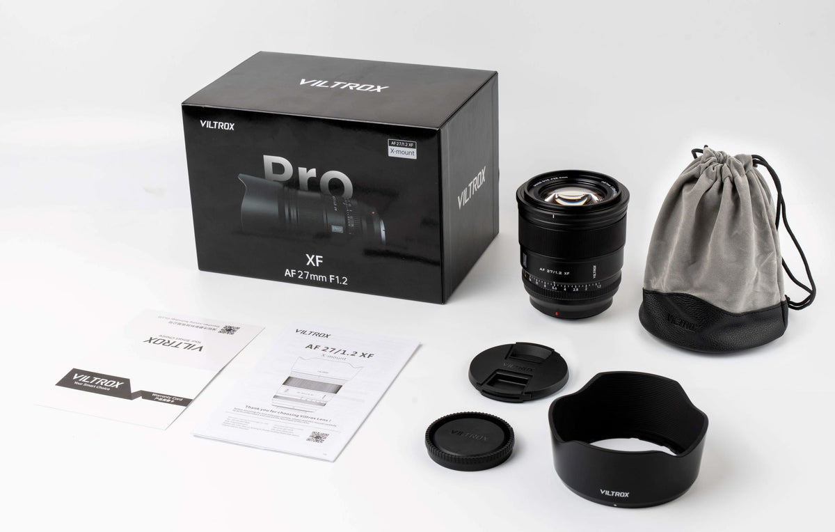 Viltrox AF 27mm f/1.2 Pro box contents: lens, hood, pouch, caps and manual