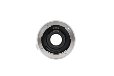 Viltrox 2.0x teleconverter front mount on white, straight-on view