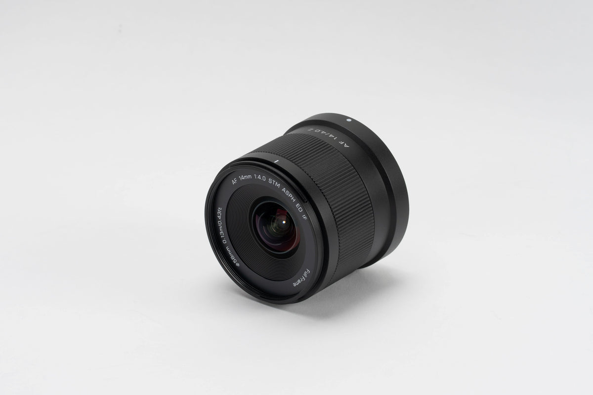 Viltrox Air AF 14mm f/4 Nikon Z lens, angled front view on grey background