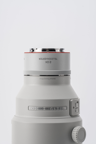 Viltrox 2.0x teleconverter mounted on a Sony 200-600mm, label close-up