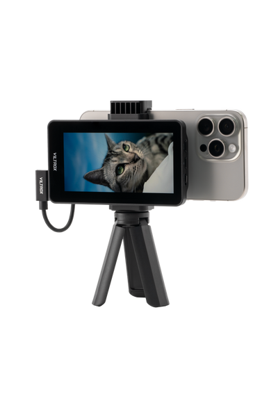Viltrox DC-T1 with iPhone and cat on screen, mini tripod on white