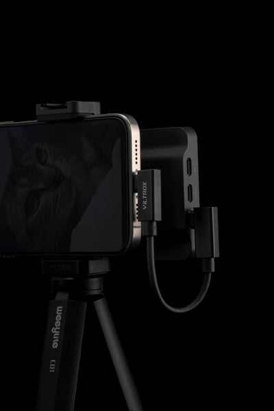 Viltrox DC-T1 USB-C cable connected to an iPhone, side view