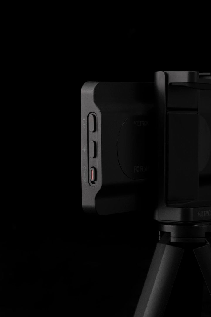 Viltrox DC-T1 side buttons and power switch close-up