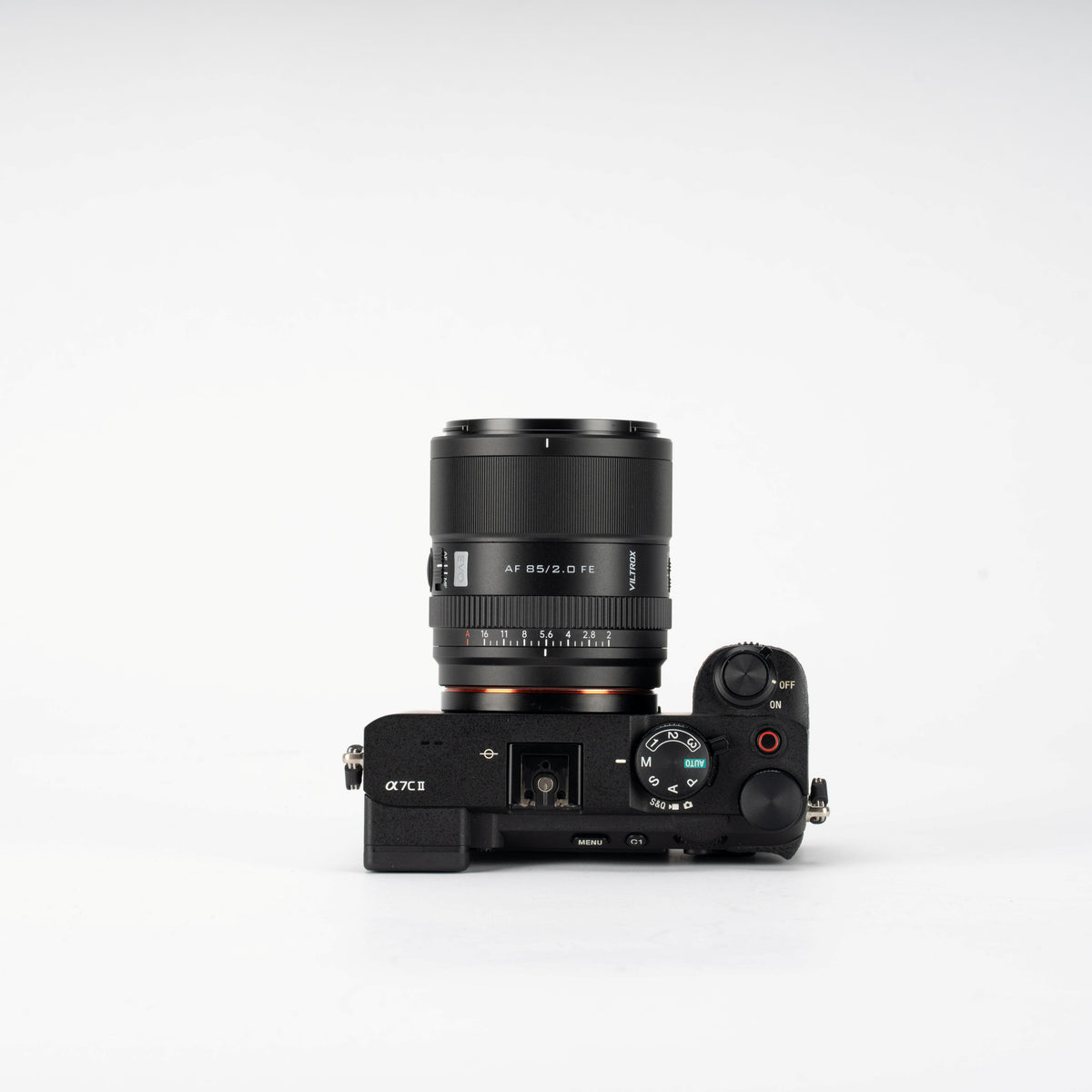 Viltrox AF 85mm f/2.0 FE on a Sony A7C II, top view on grey