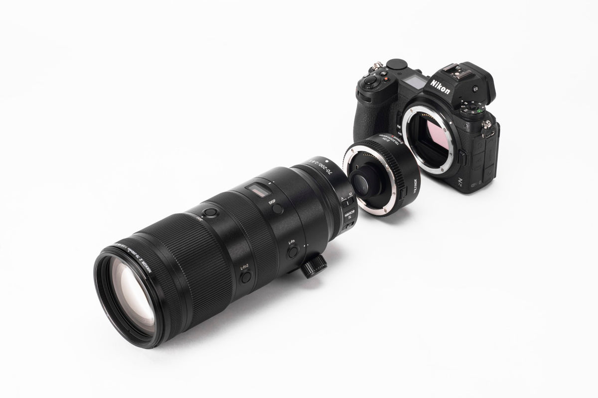 Viltrox 2.0x teleconverter fitted between a Nikon Z camera and a telephoto zoom lens