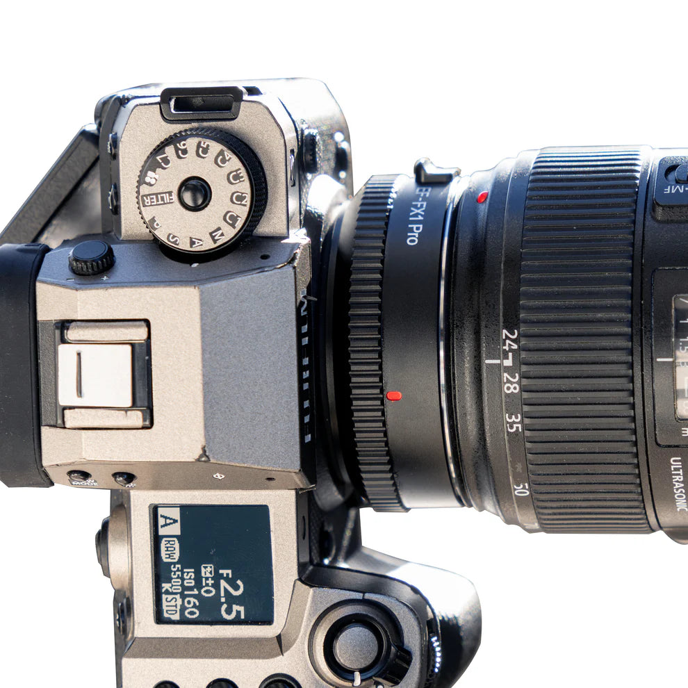 Viltrox EF-FX1 Pro adapter on a Fujifilm camera with a Canon EF zoom lens, top view