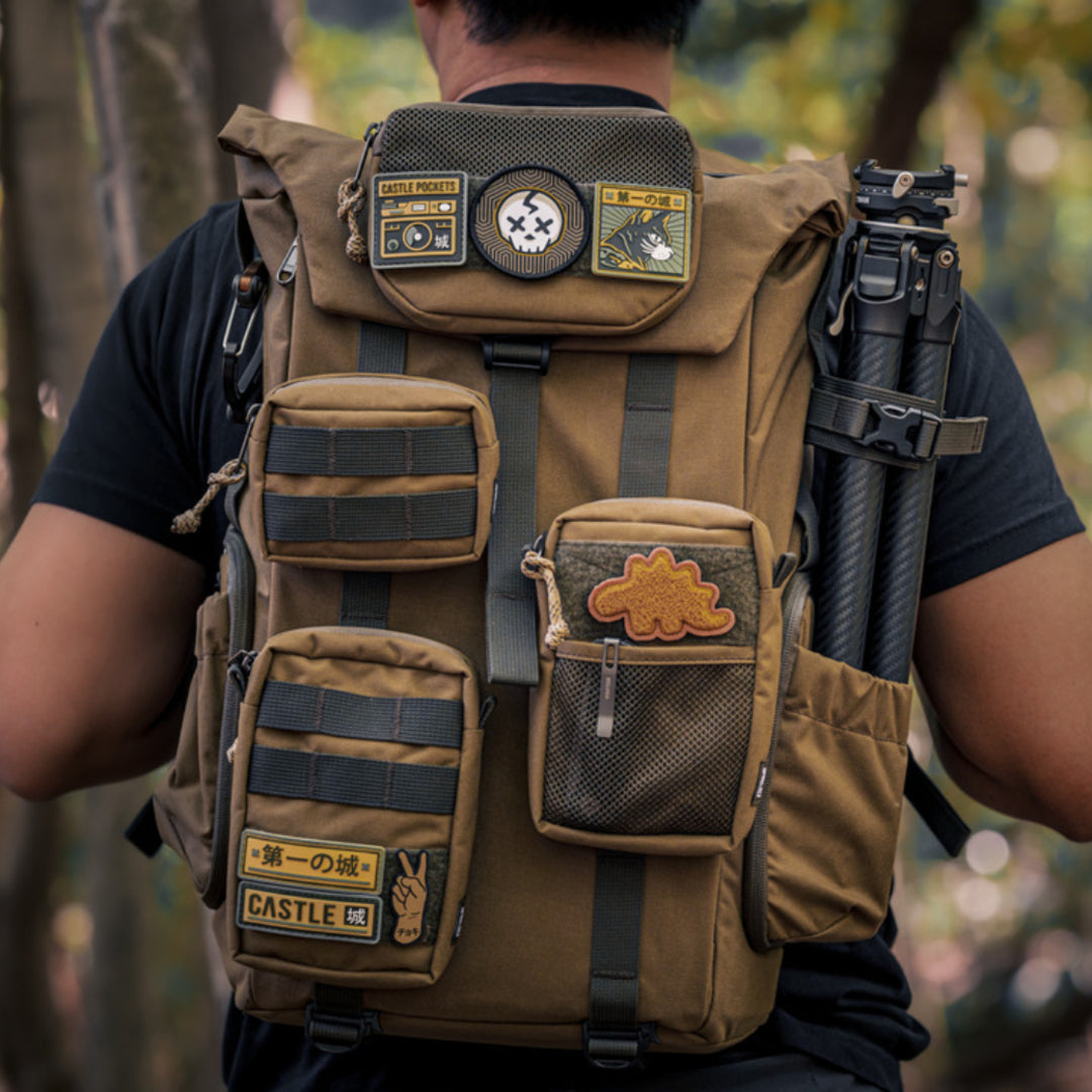 Khaki Wotancraft backpack fitted with several Armor pockets and patches