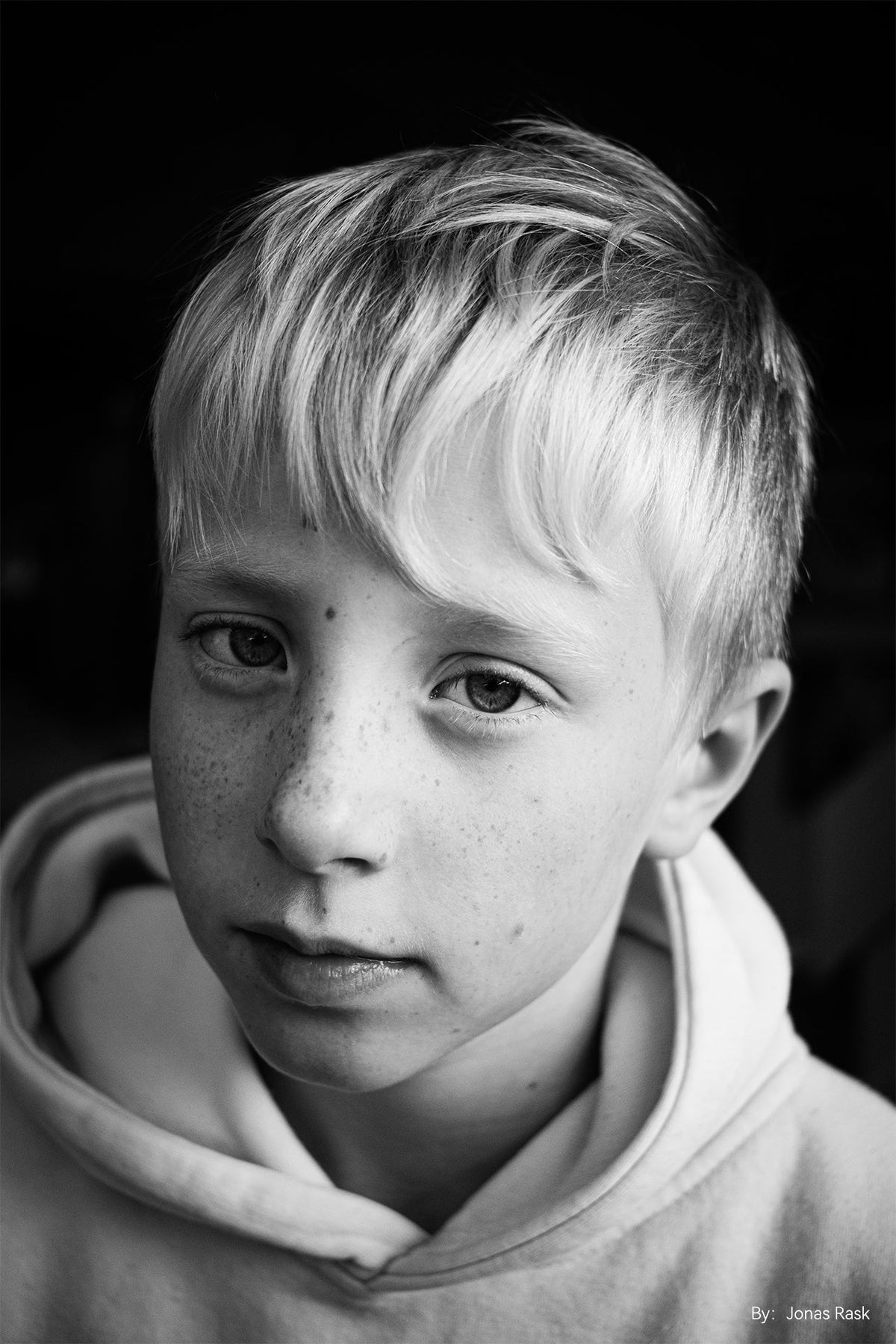 Black and white portrait of a freckled boy, TTArtisan AF 27mm f/2.8 sample