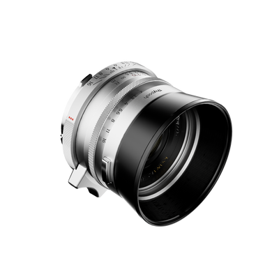 Thypoch Ksana 35mm f/2 silver lens with round lens hood fitted