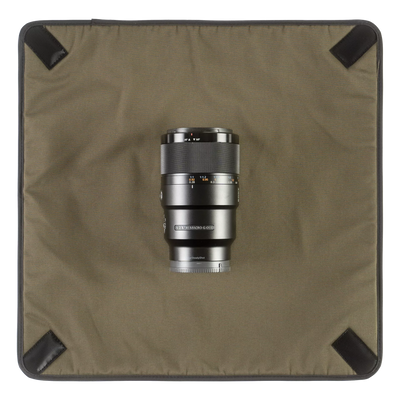 Wotancraft Magician Wrap laid flat with a Sony telephoto lens