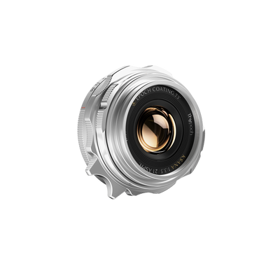 Thypoch Ksana 21mm f/3.5 ASPH Leica M lens in silver, angled view of the coated front element