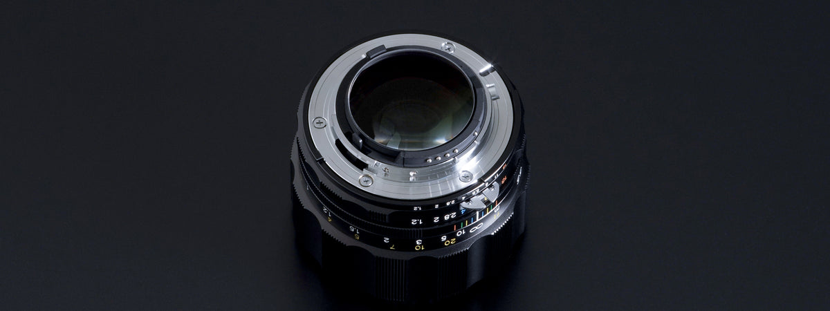 Voigtlander Nokton 55mm f/1.2 SL IIs, rear view of the Nikon F mount on black