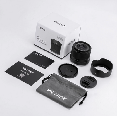 Viltrox AF 25mm f/1.7 Z box contents: lens, hood, caps, storage bag and cards